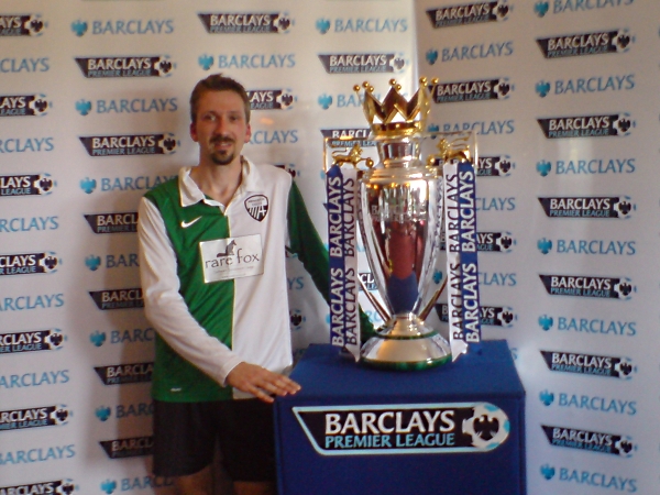 Rare Fox Director David Bannister with the Premier League Trophy